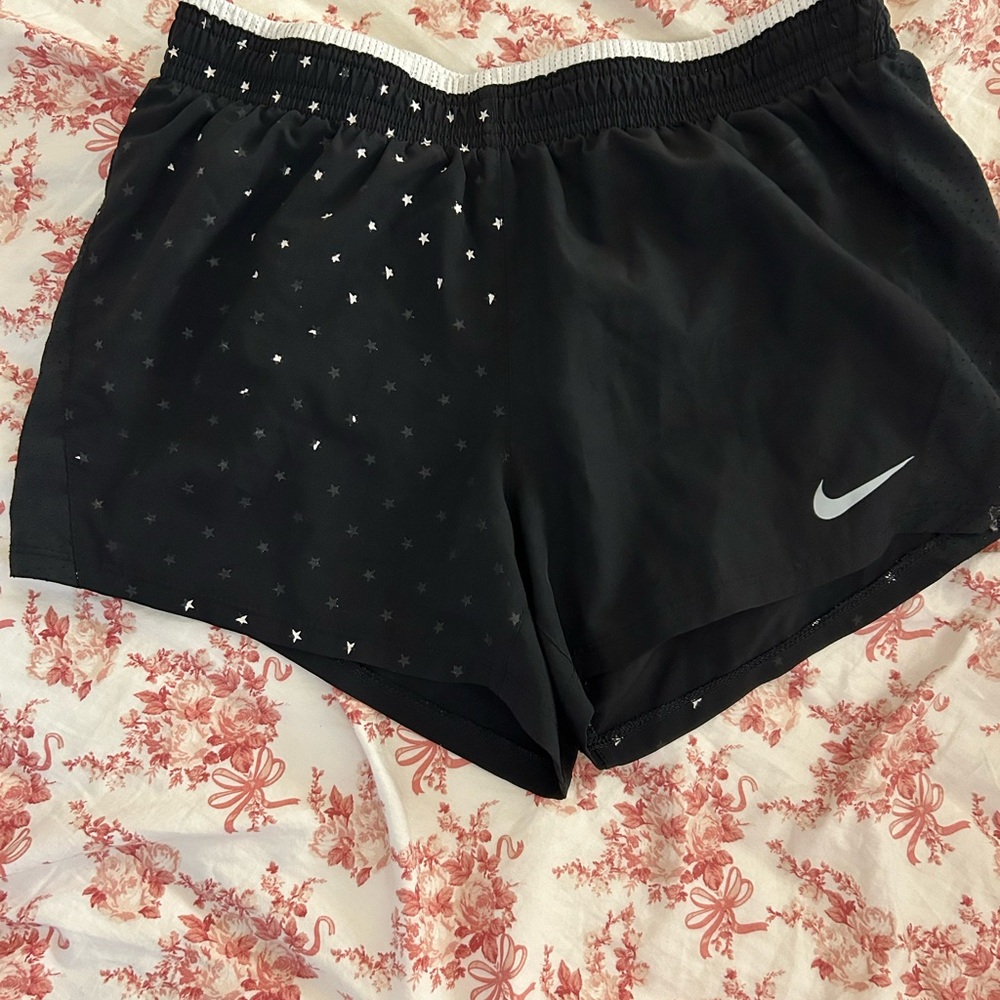 Nike Women's Black Athletic Shorts with Silver Accents
